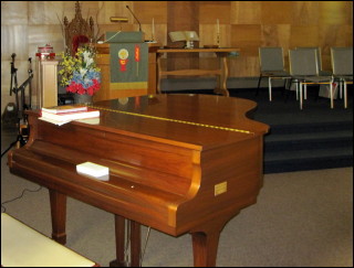 A piano accompanies hymns from VOICES UNITED & MORE VOICES and the children's hymn. The Church Choir often presents a special musical choice. Church members and their children are welcome to perform.